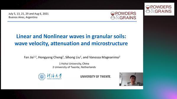 Elastic wave velocity and attenuation in granular material