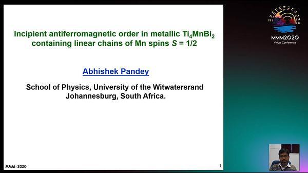 Incipient antiferromagnetic order in metallic Ti4MnBi2 containing linear Mn chains of spin S = 1/2